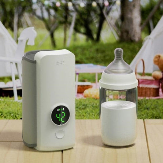 Baby bottle warmer wrapped around bottle in use