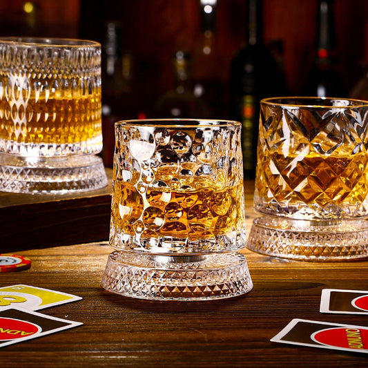 whiskey glass rotating crystal base close-up
