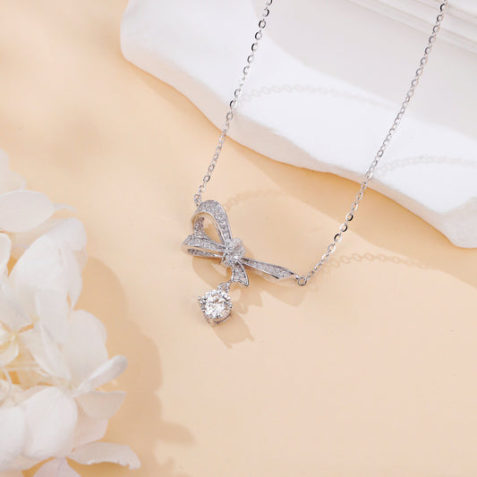 925 Sterling Silver Bow Necklace with Moissanite Pendant β photo 2 of 6