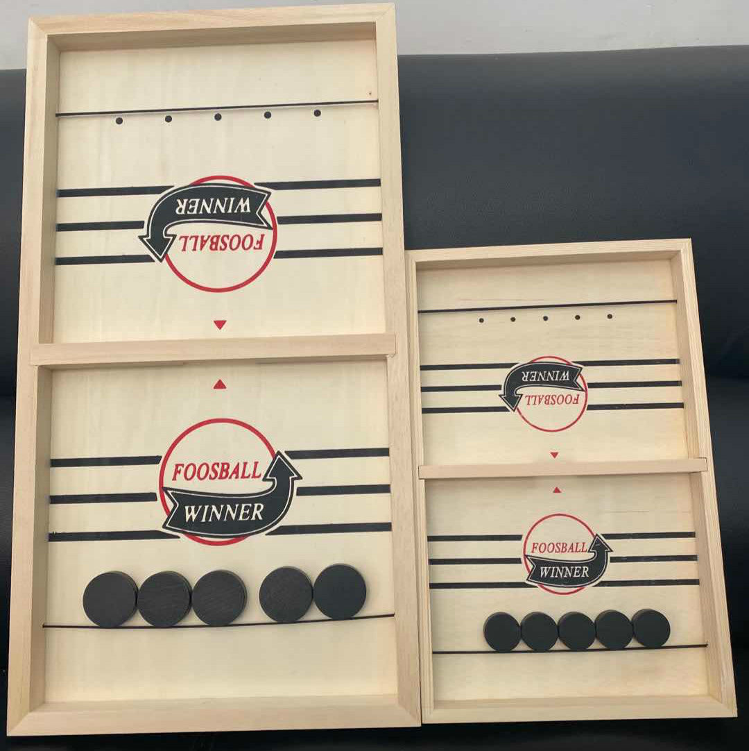 Wooden puck game pieces and board