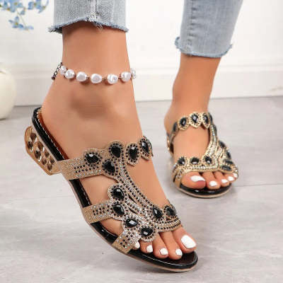 Close-up of fish mouth toe design on chunky sandals