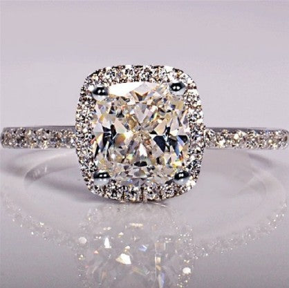 Engagement ring shown with gift box packaging