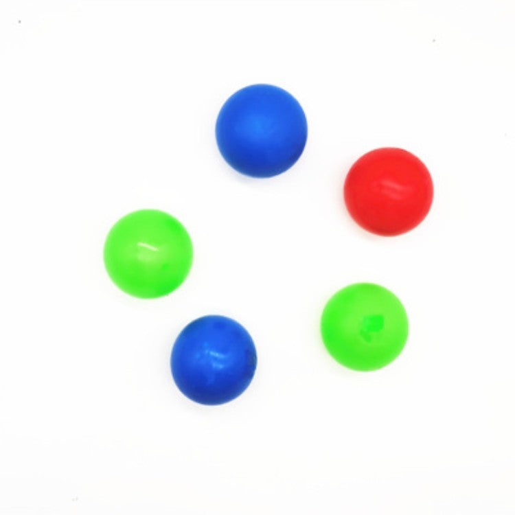 Sticky squash ball stuck to wall