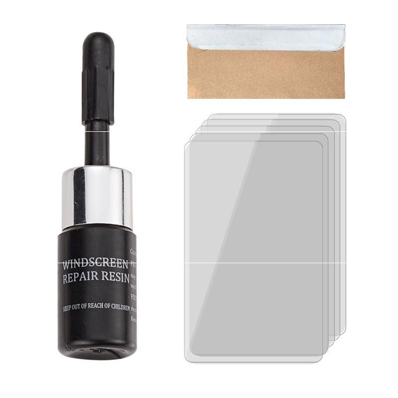 Windshield repair kit in use on car glass
