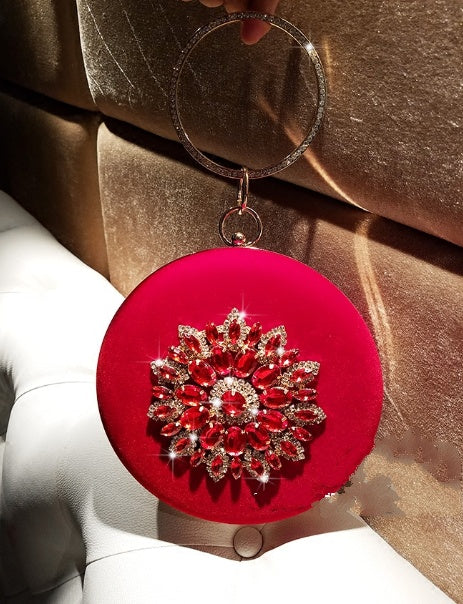 LOLIBOX velvet round clutch, ring handle detail