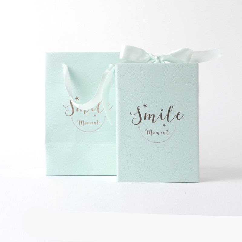 Small cardboard gift box, front view