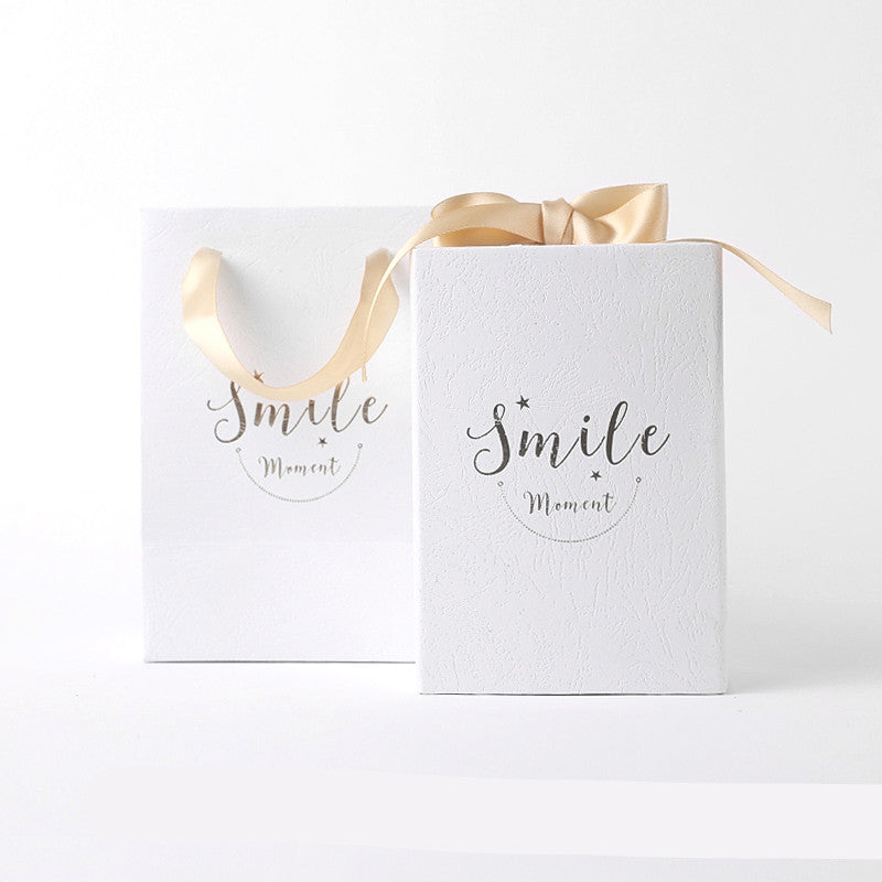 Small gift box with matching handbag carrier