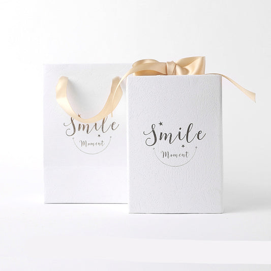 Small gift box with matching handbag carrier