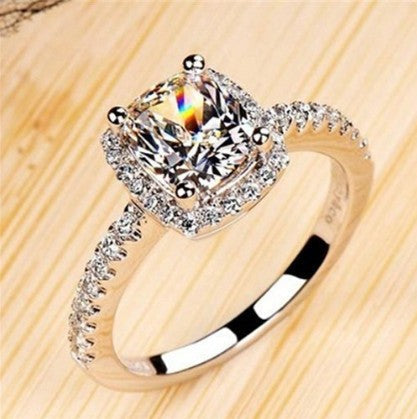 Ring shown worn on hand for scale
