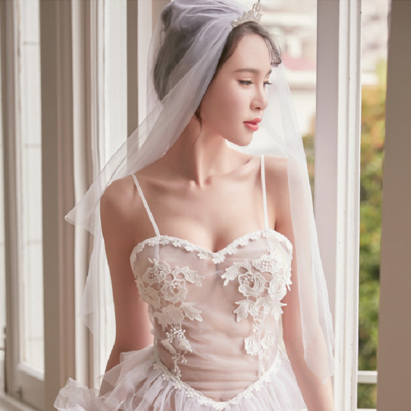 Close-up of lace fabric texture on lingerie dress