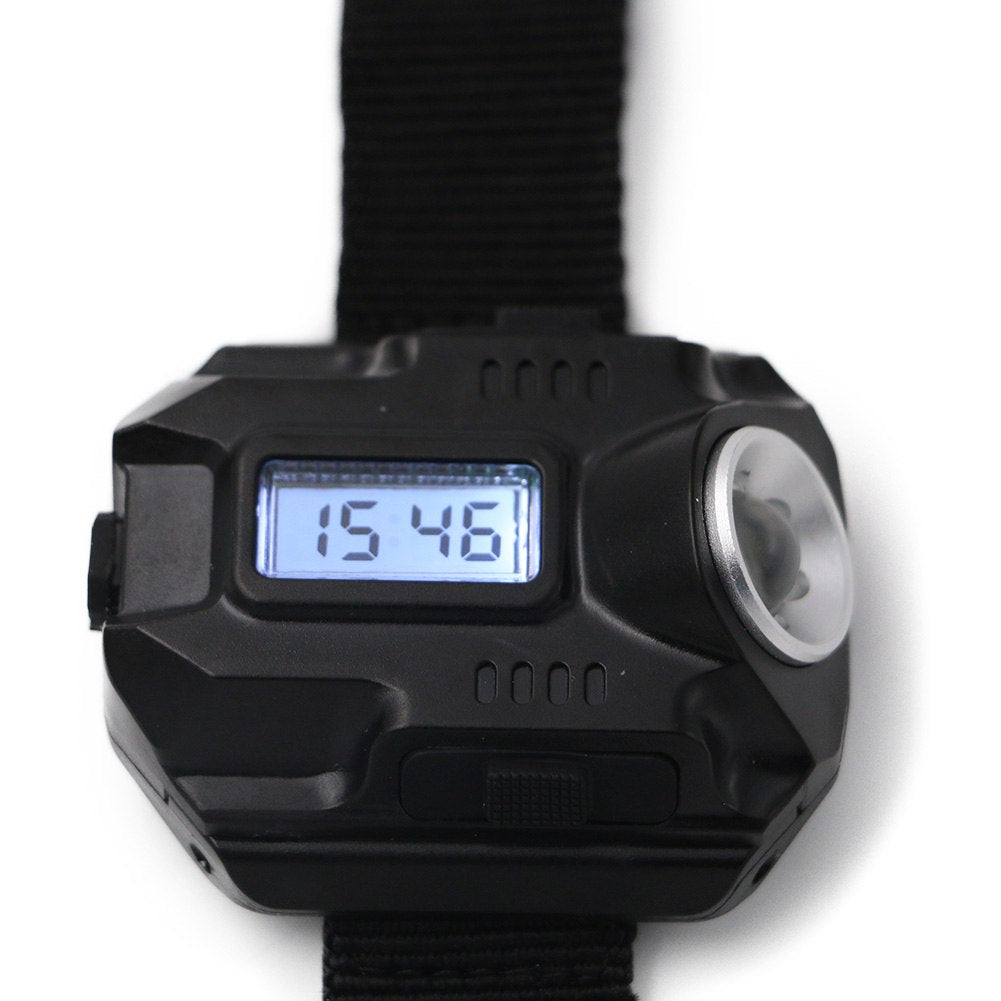 LED flashlight watch compass display close-up