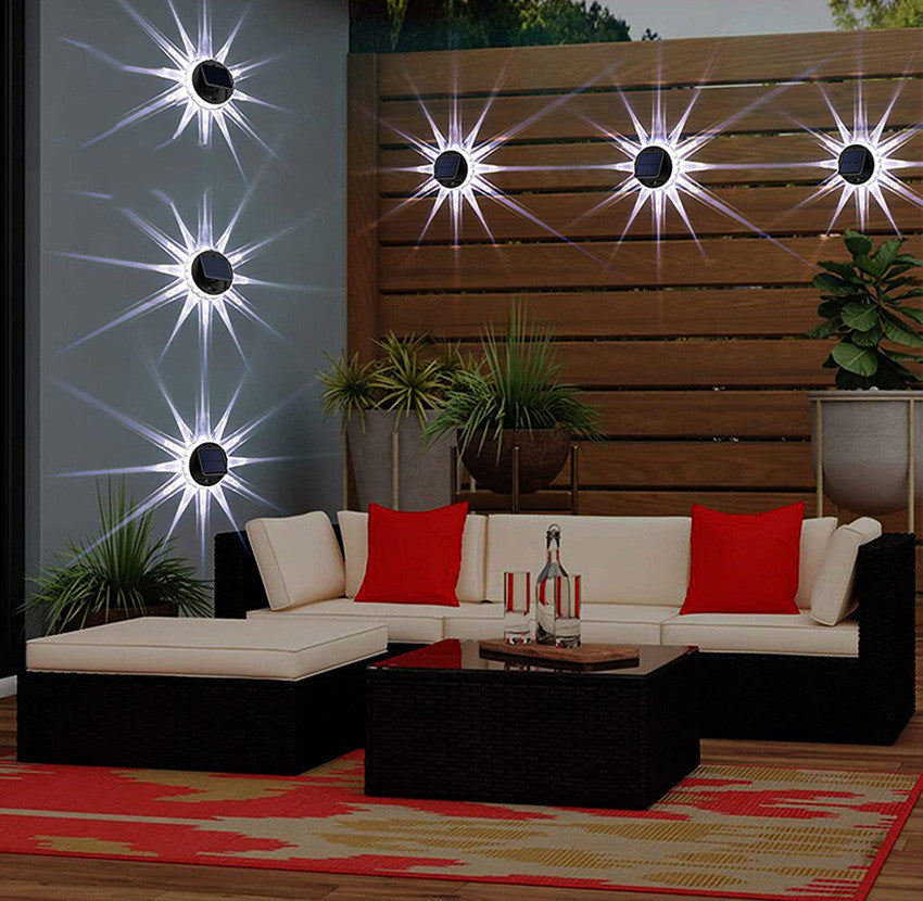 Solar wall light lit up at night