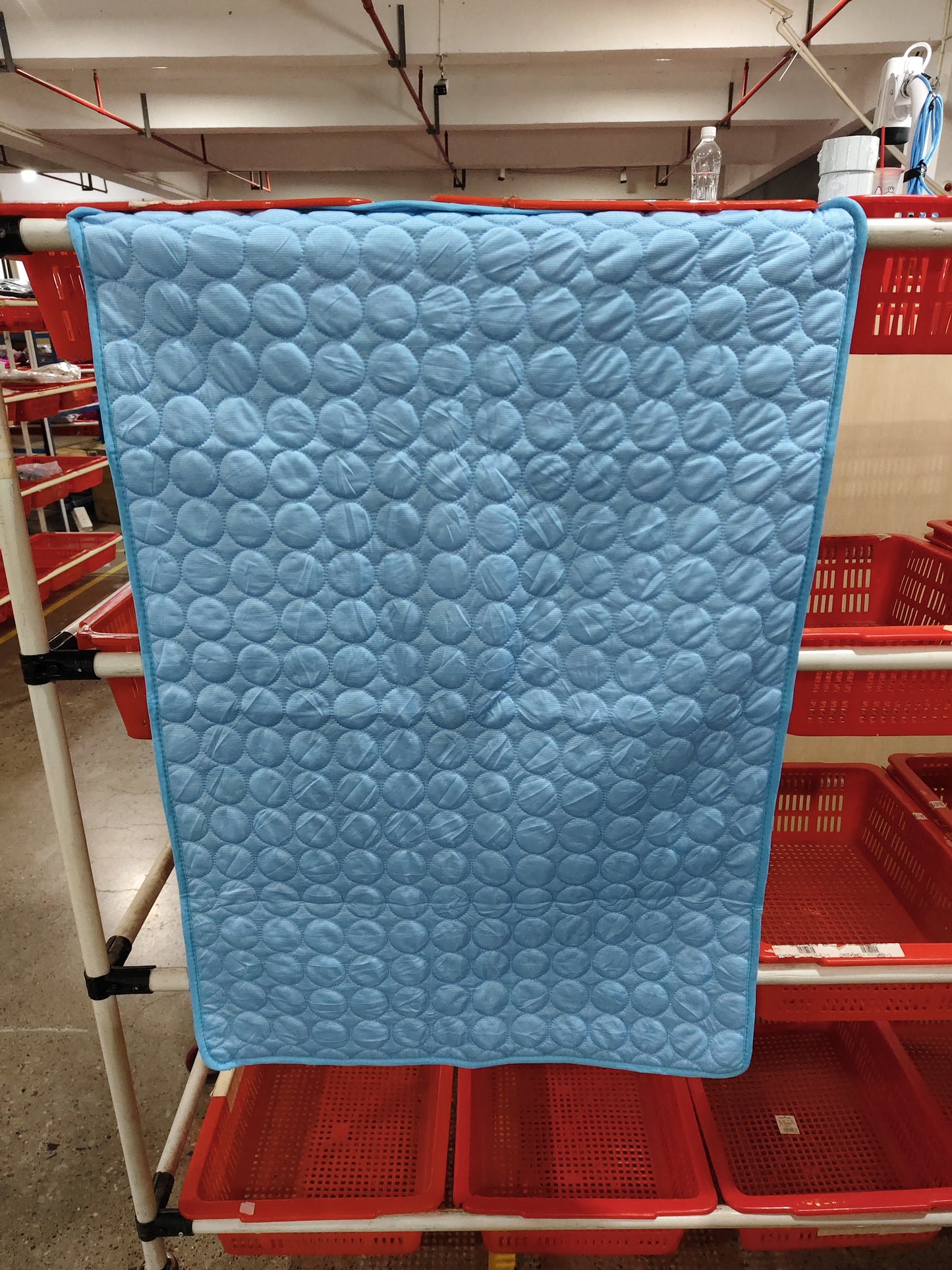 Cooling mat shown in blue colorway