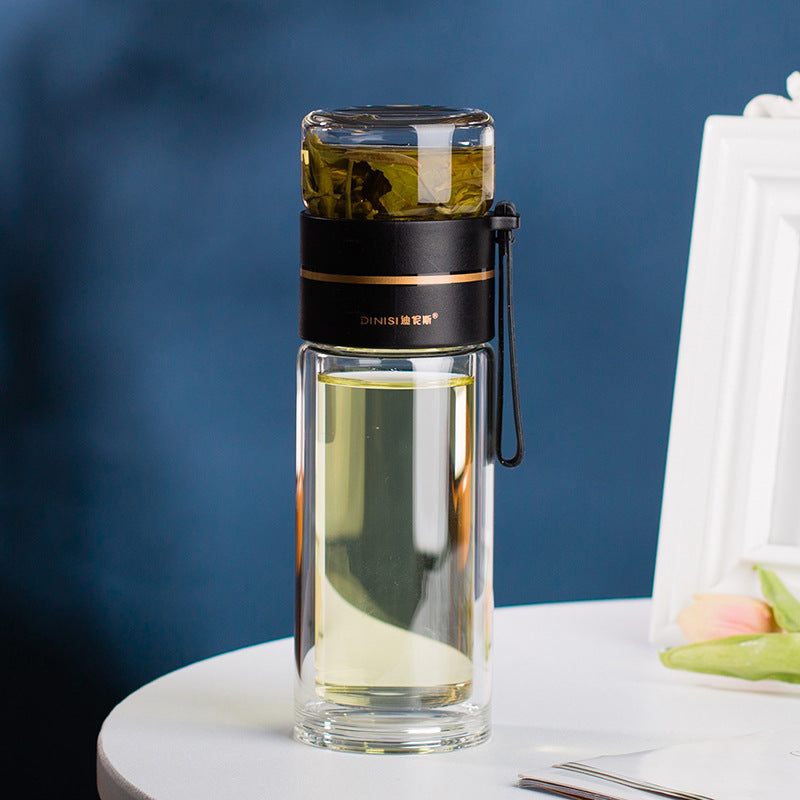 Glass tea infuser bottle disassembled for cleaning