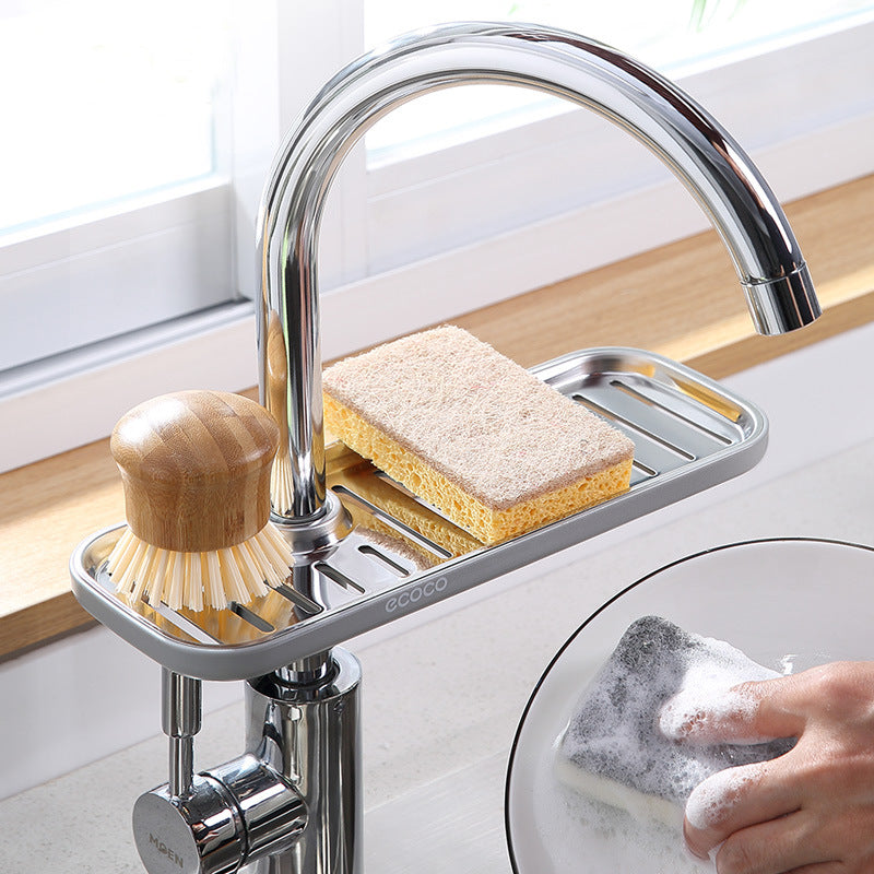 Faucet shelf holding sponge and soap