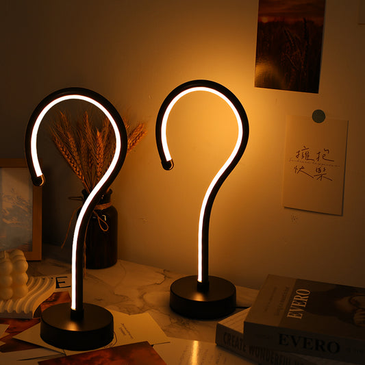 question mark shape LED desk lamp, lit view