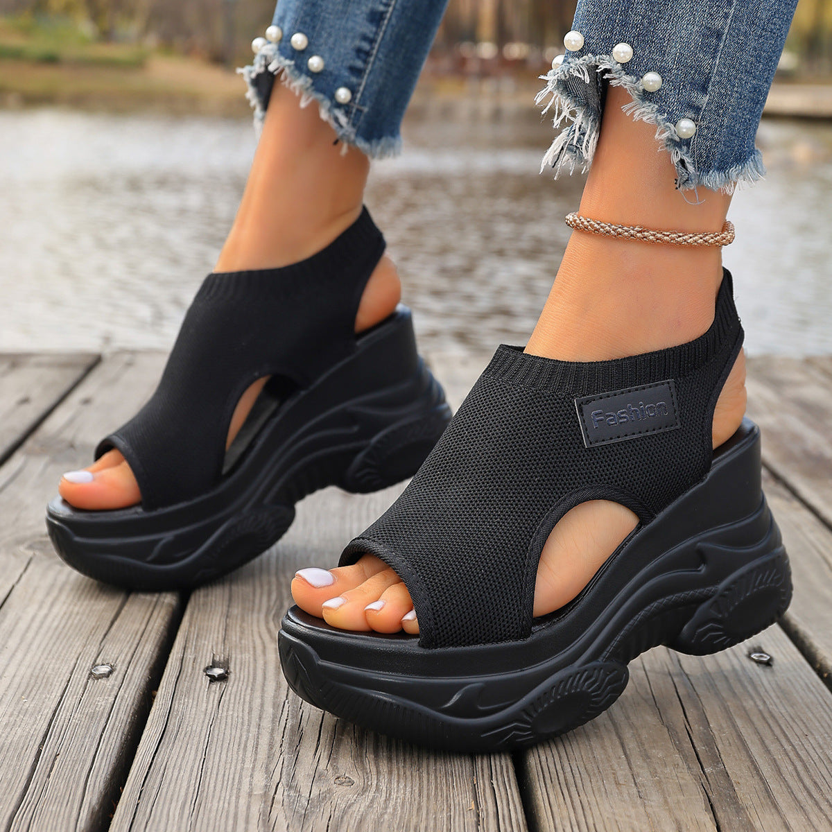 Fish mouth sandals worn outdoors