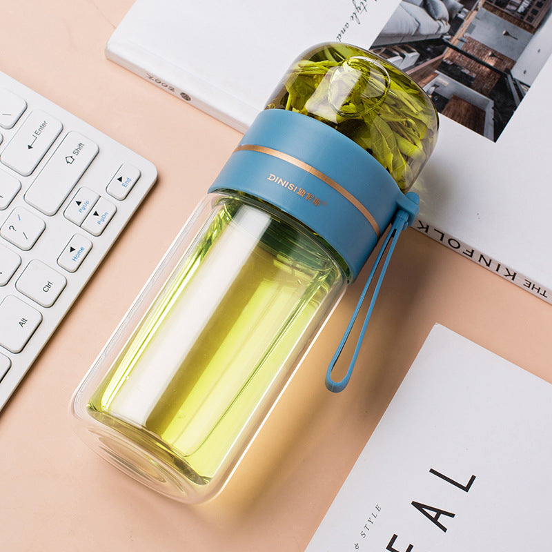 Glass tea bottle with rope handle close-up