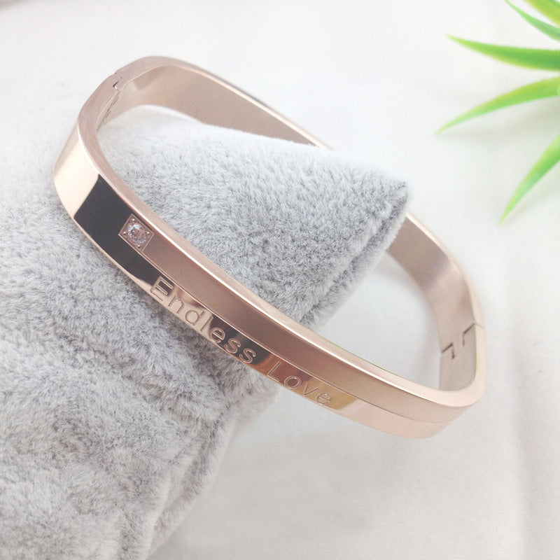 Titanium steel couple's bracelet set, front view