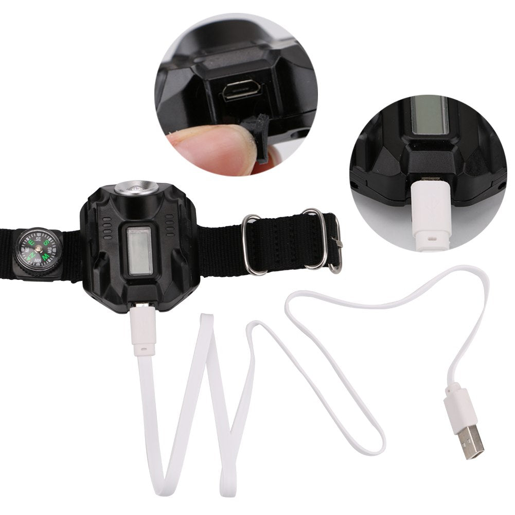 LED flashlight watch illuminated in use outdoors