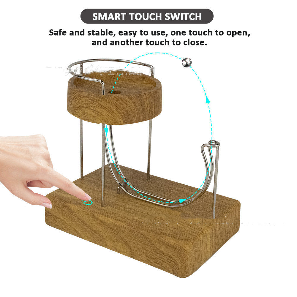 Marble machine in motion with steel balls