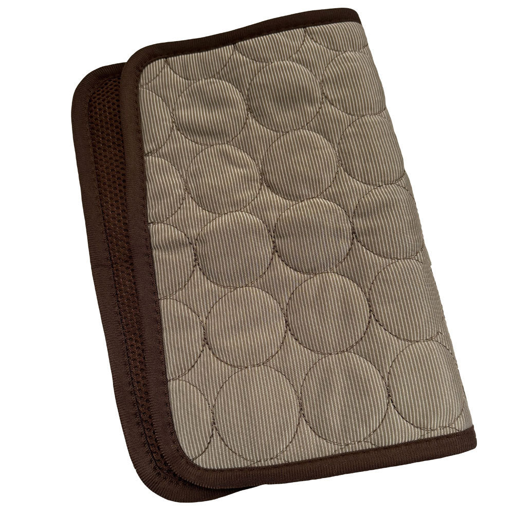 Cooling mat placed in pet bed