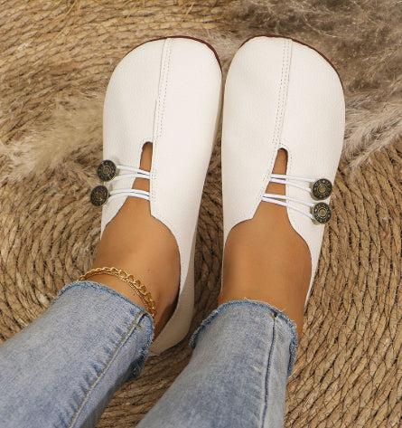 Flat sandals worn, front view