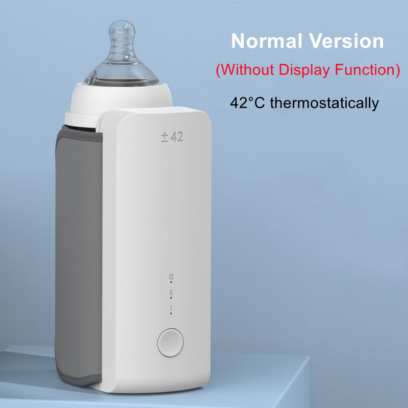 Baby bottle warmer fitted on glass bottle