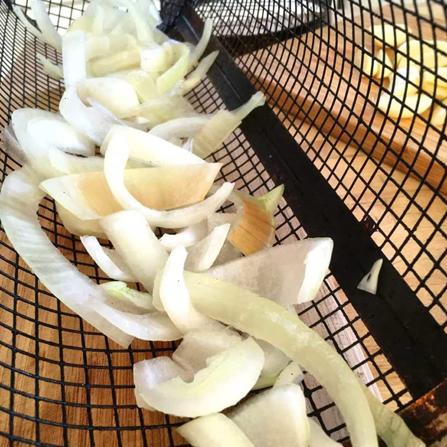 Rolling grill basket with cooking oil spray bottle