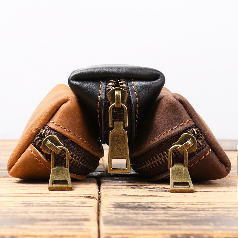 Leather clutch purse open showing interior compartments