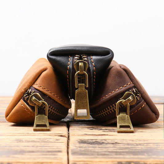 Leather clutch purse open showing interior compartments