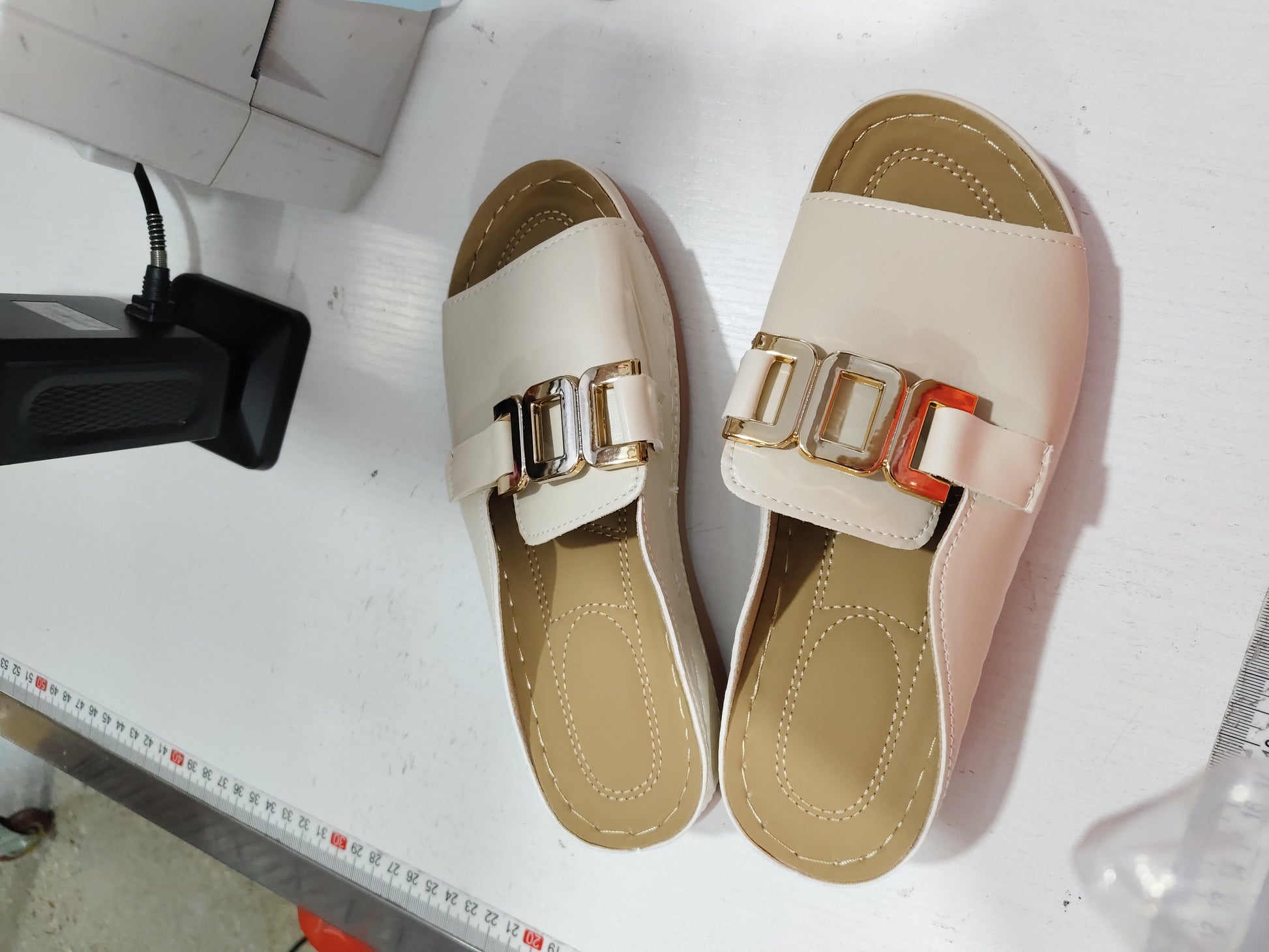 Peep toe wedge sandals worn outdoors