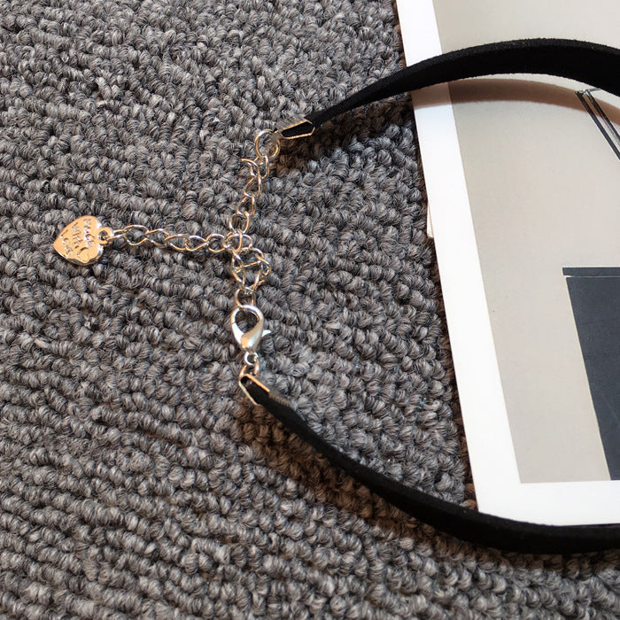 Studded choker necklace worn on neck
