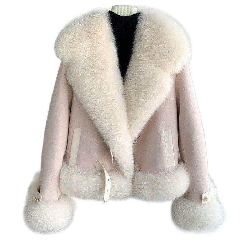 Faux fur coat styled with jeans and sweater