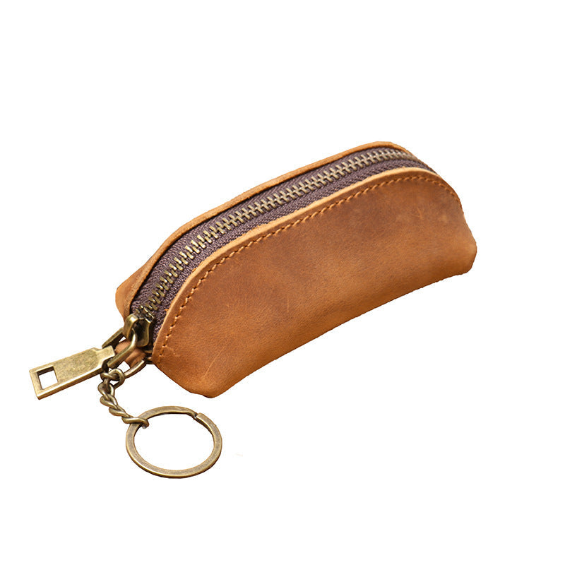 Leather clutch shown in brown yellow colorway